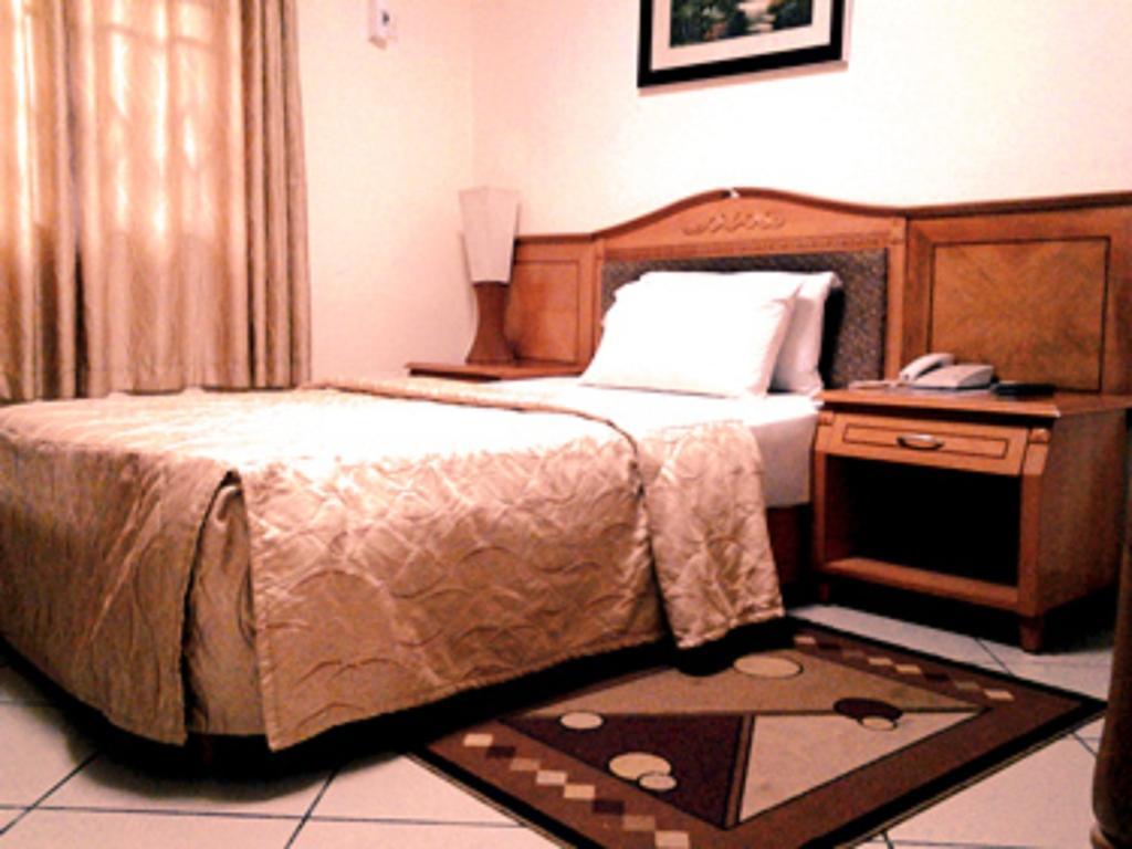 Sunset Hotel Kumasi Habitación foto