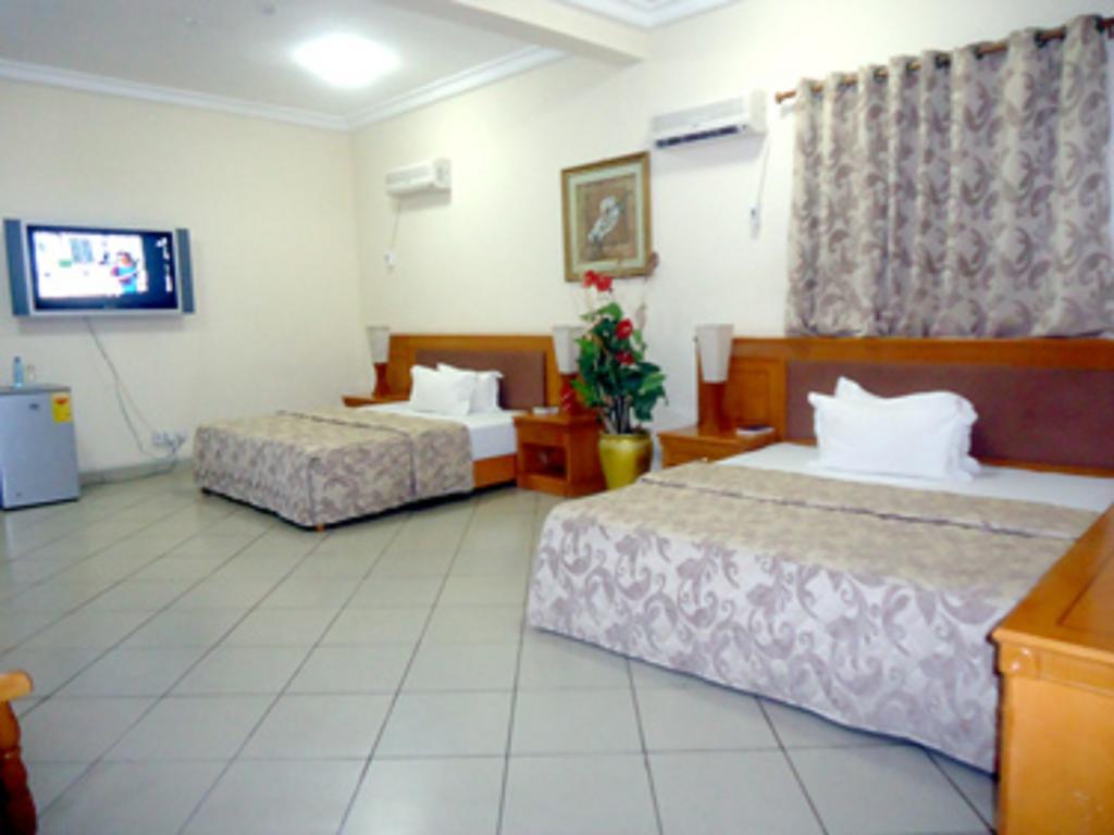 Sunset Hotel Kumasi Habitación foto